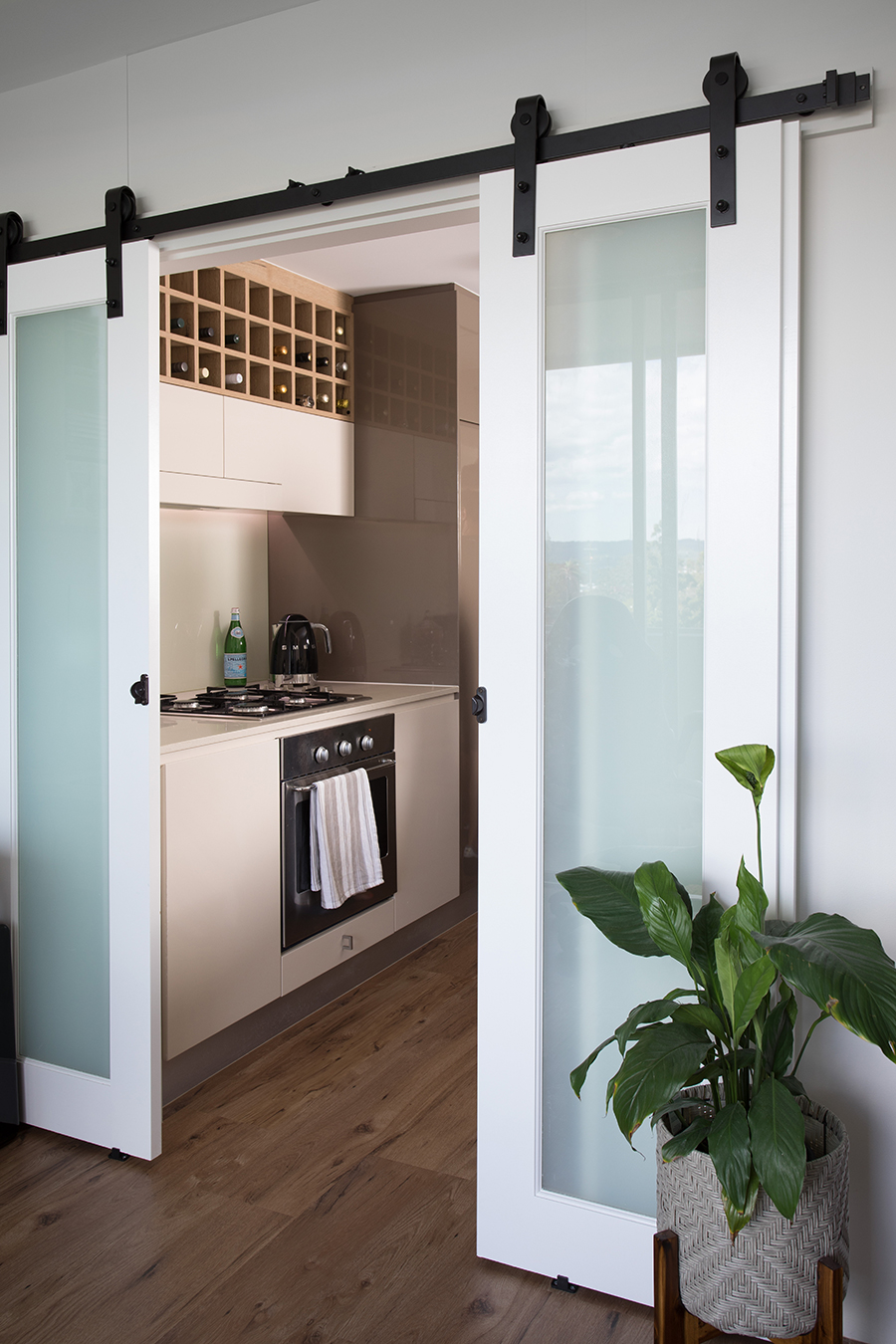 Ivy + Finch apartment interior design sliding door