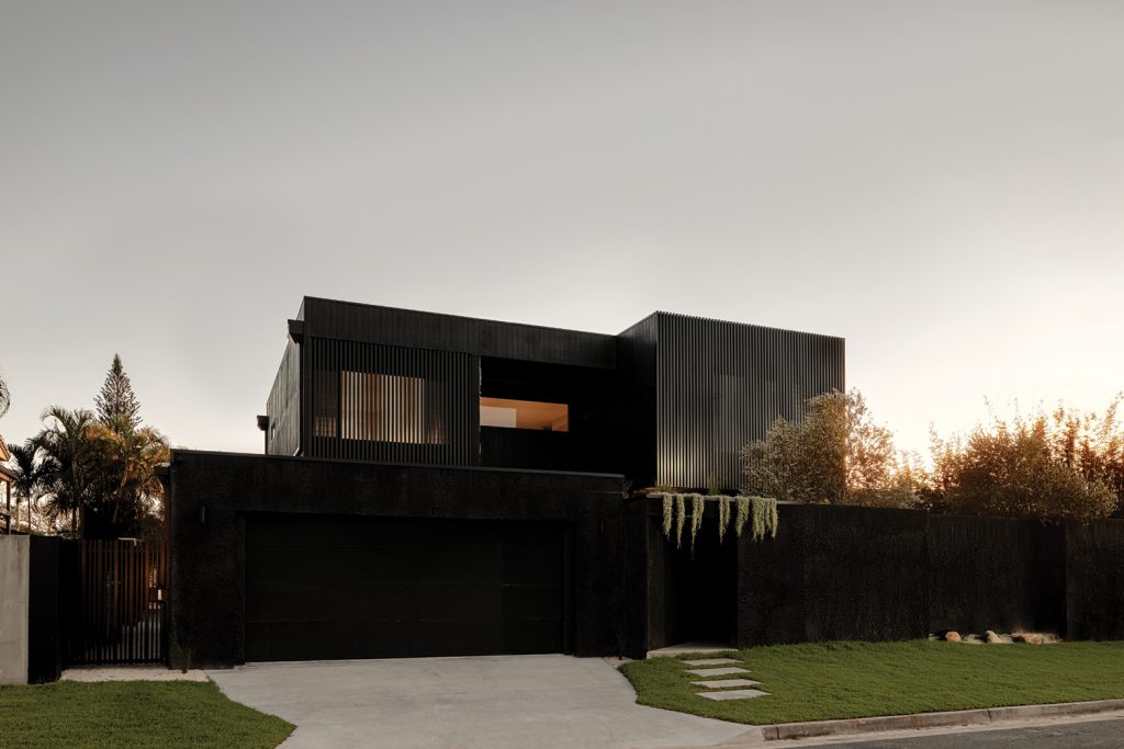 dark modern coastal home carmichael build