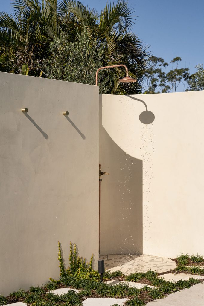 Invilla Architecture modern family home outdoor shower