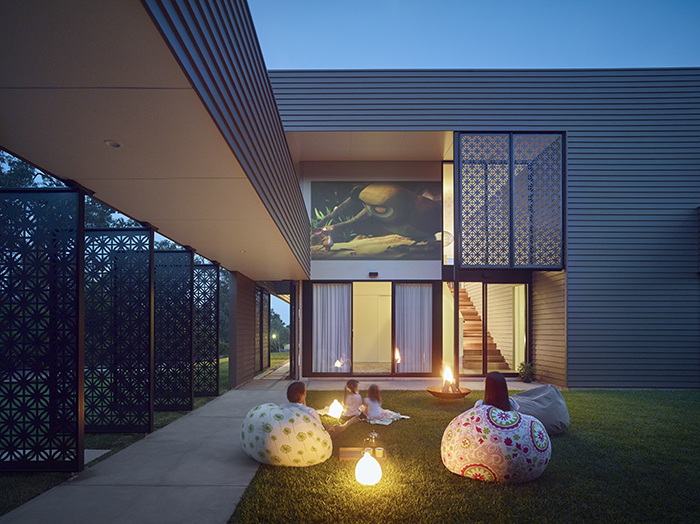 Courtyard at night - The Bird House by Jamison Architects