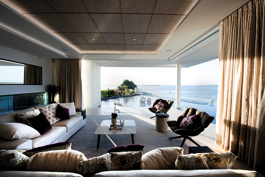 This incredible waterfront home epitomises island luxe living ...