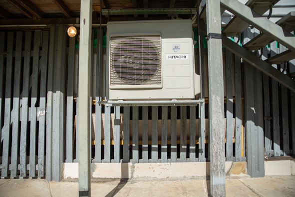 elevated or raised air conditioning unit for flood-resilience