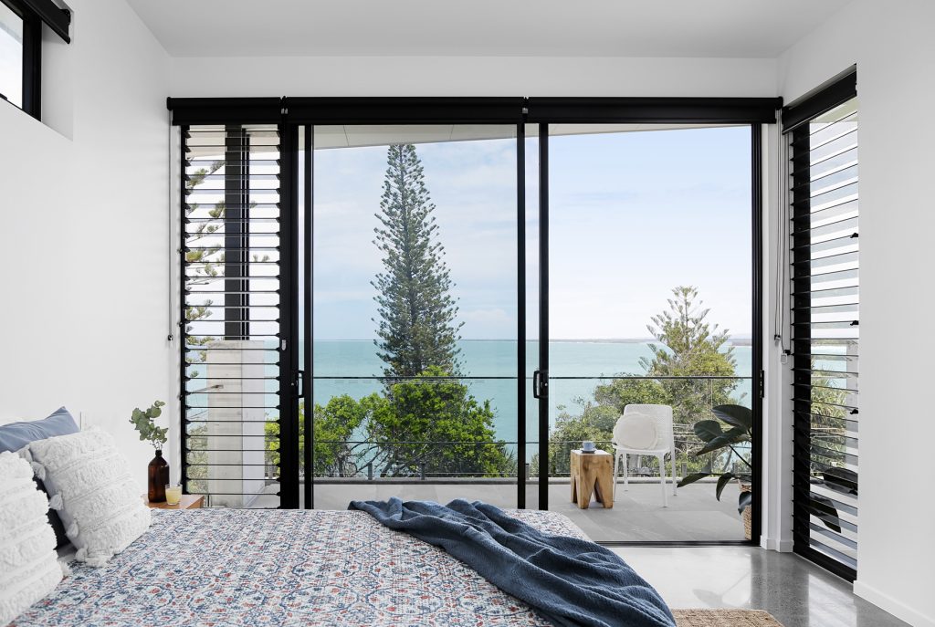Modern-beach-house-Margaret-st-Kings-beach-by-the-shores-of-Caloundra-Sunshine-Coast-masters-bedroom-with-balcony-and-views-of-the-beach