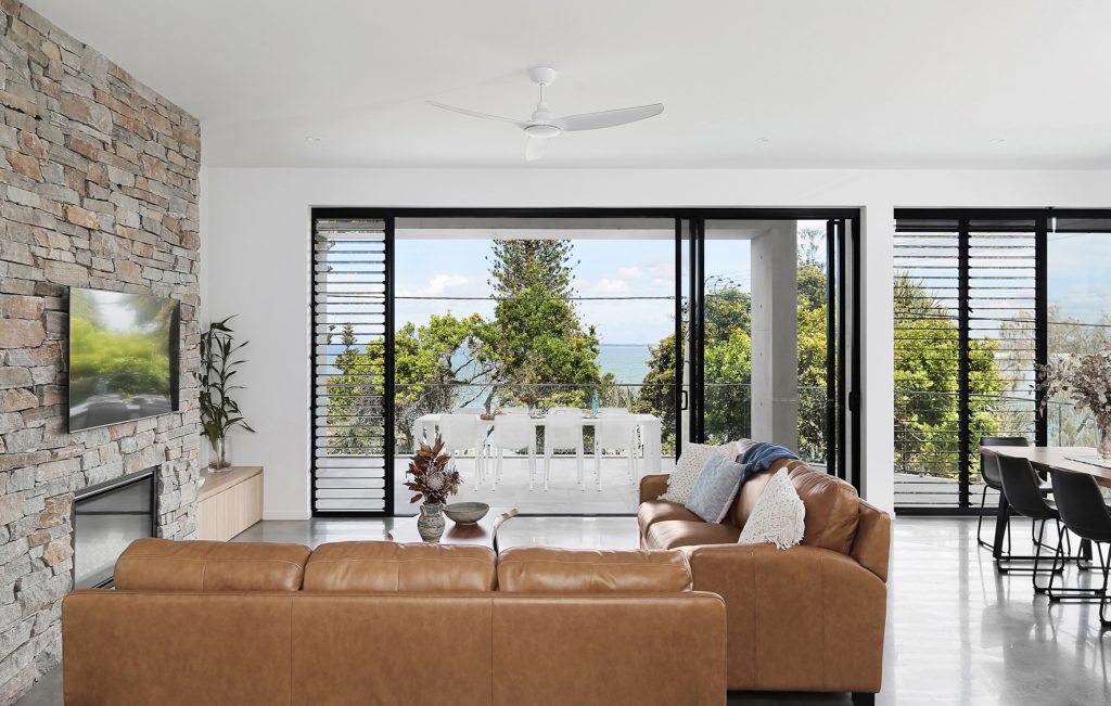 Modern-beach-house-Margaret-st-Kings-beach-by-the-shores-of-Caloundra-Sunshine-Coast-interior-indoor-outdoor-living-room-or-lounge-area